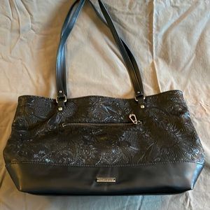 Brand new never used Sakroots black embroidered bag